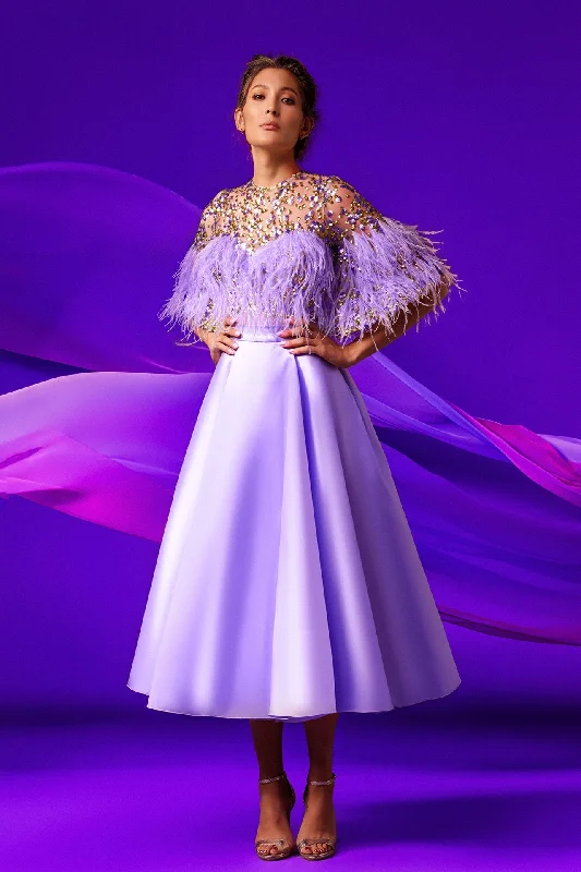 Feathered and beaded top featuring cloche skirt linen skirt relaxed