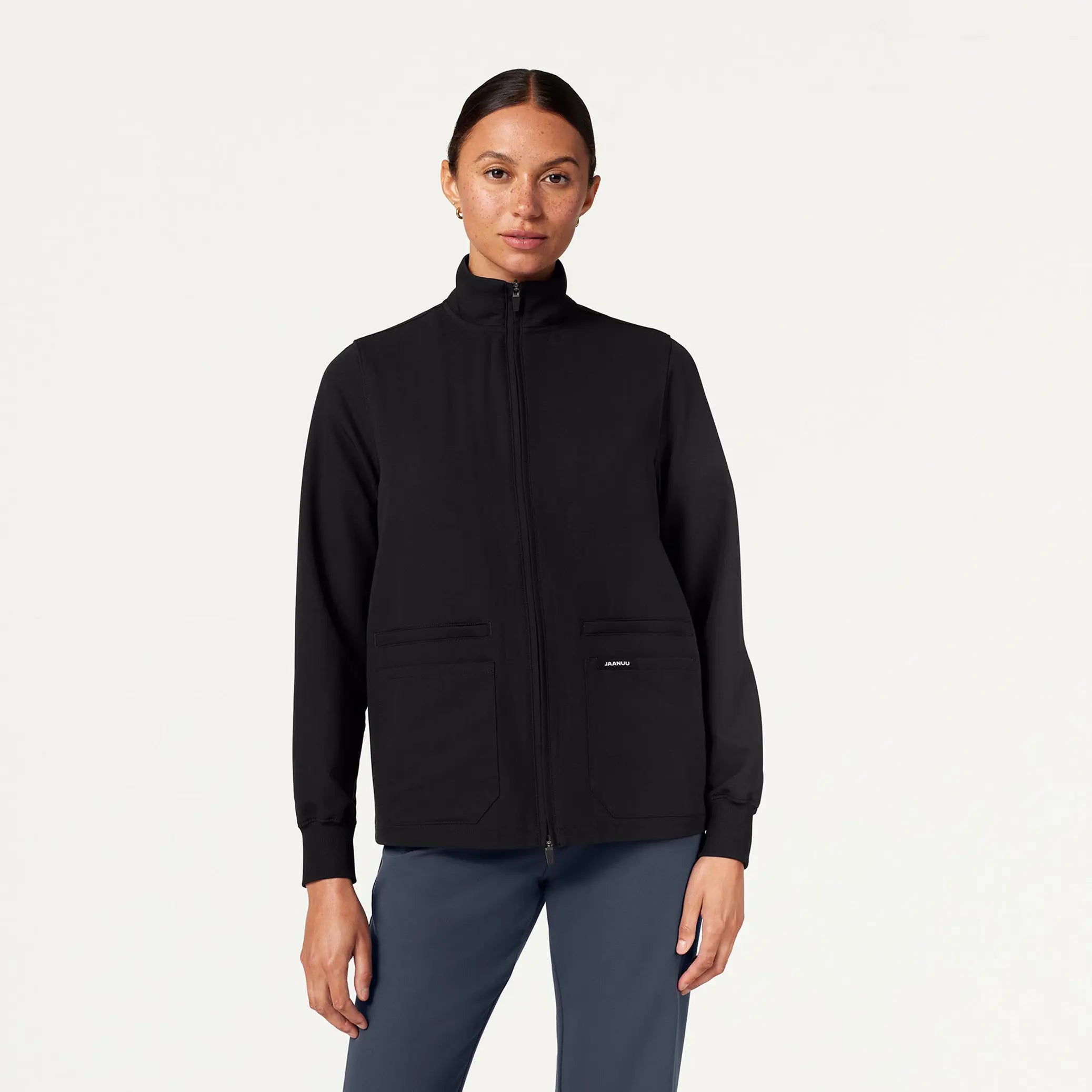 Jaanuu Women's Ceri Essential 6-Pocket Scrub Jacket - Black Insulated Jacket Fitted Jacket Loose Jacket