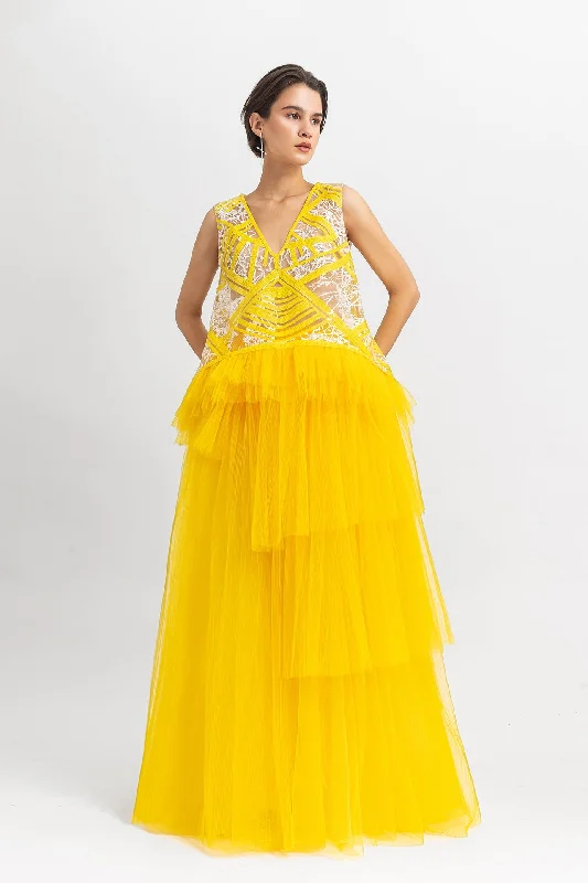 Straight cut sequin top with ruffled tulle details paired with a fully pleated wide tulle skirt corduroy skirt cozy