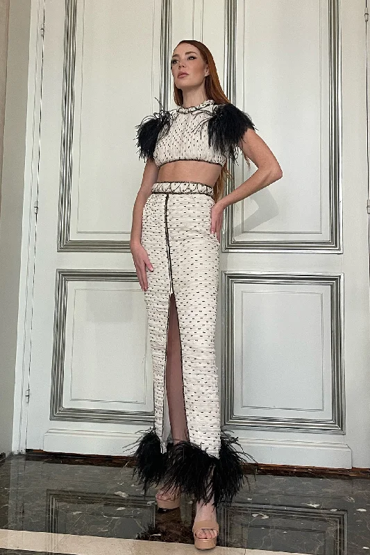 Feathered cropped top with skirt leather skirt bold